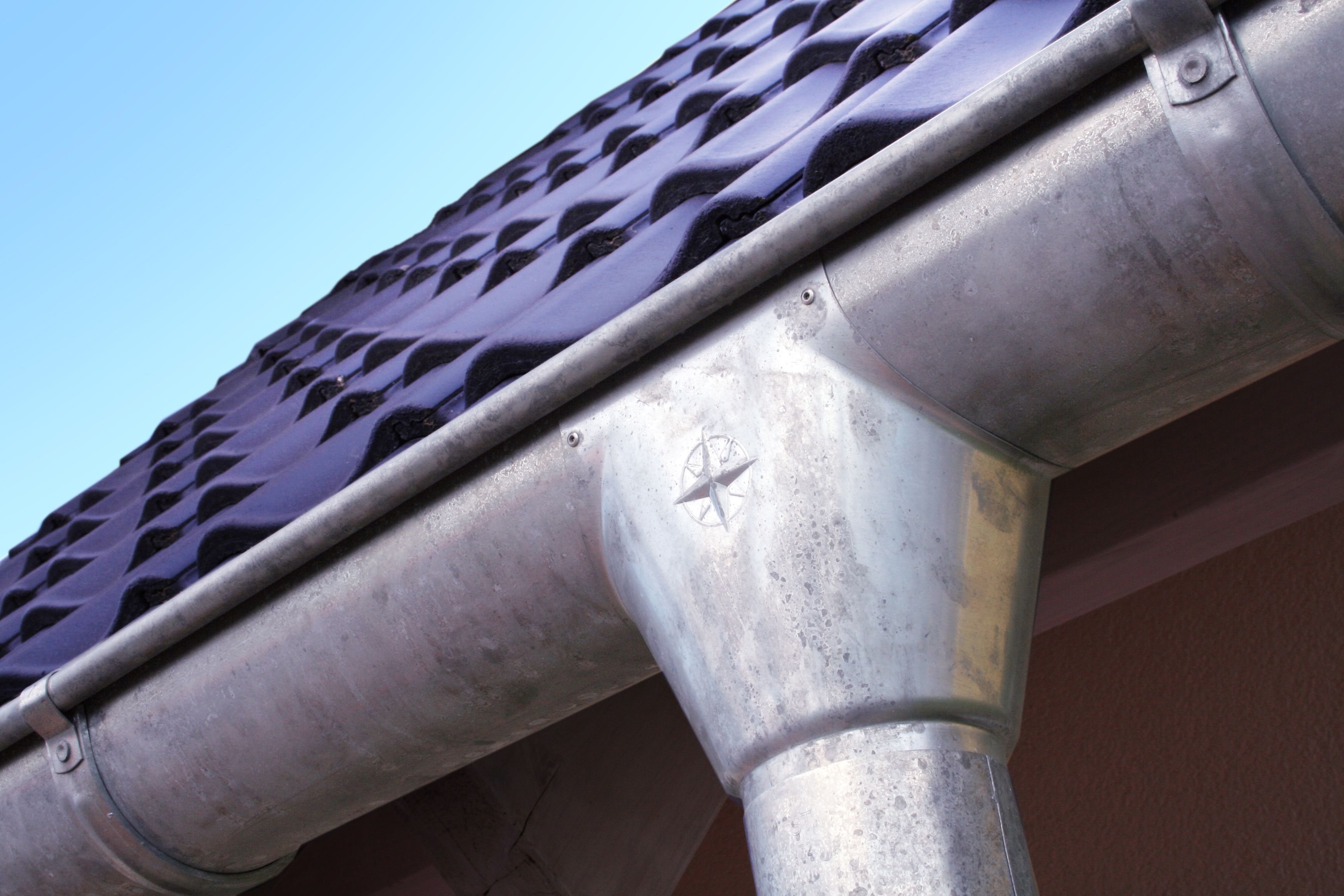 Removing Black Streaks From Aluminum Gutters In Ann Arbor MI